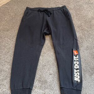 Nike Black Joggers with Just Do It Graphic